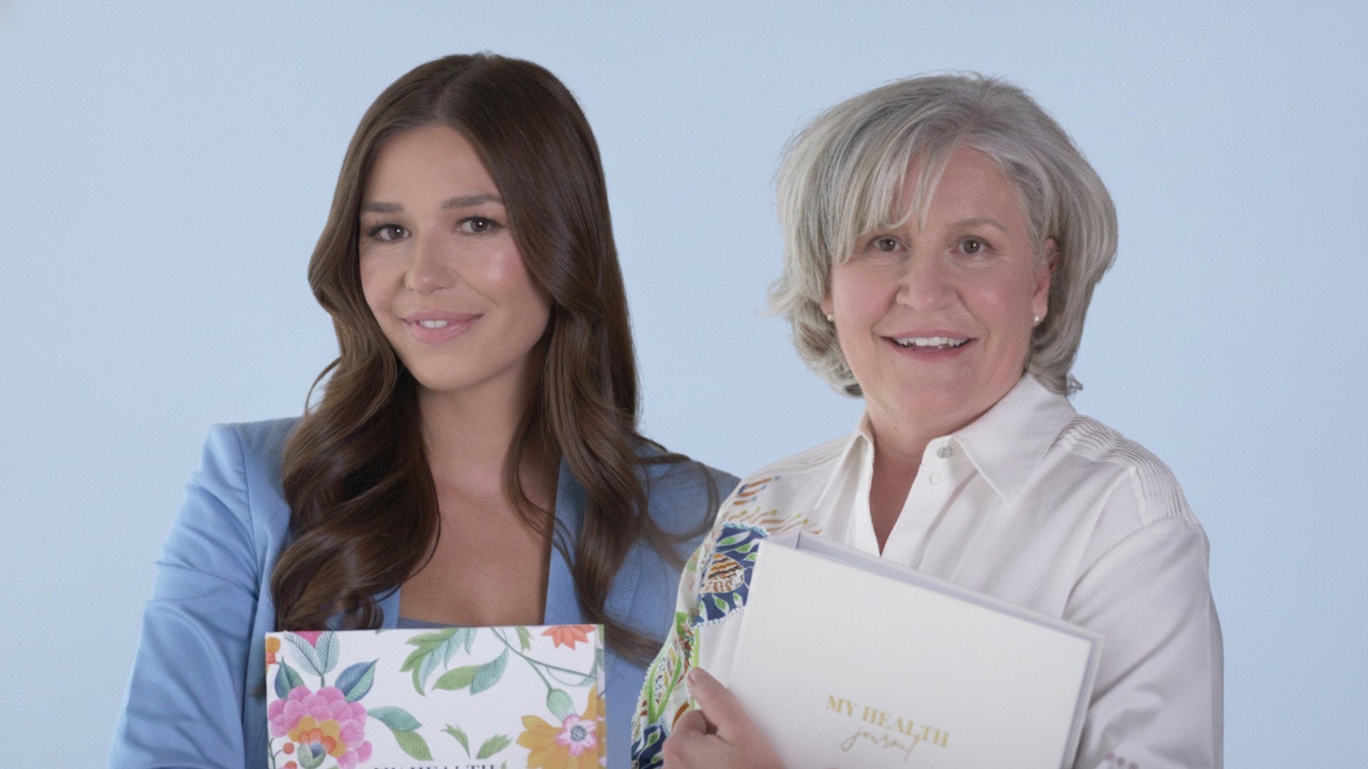 Shelley McLellan, Licensed Practical Nurse and co creator of My Health Journals, and Kyra Weston holding My Health Journal Floral Linen to support patients and caregivers.
