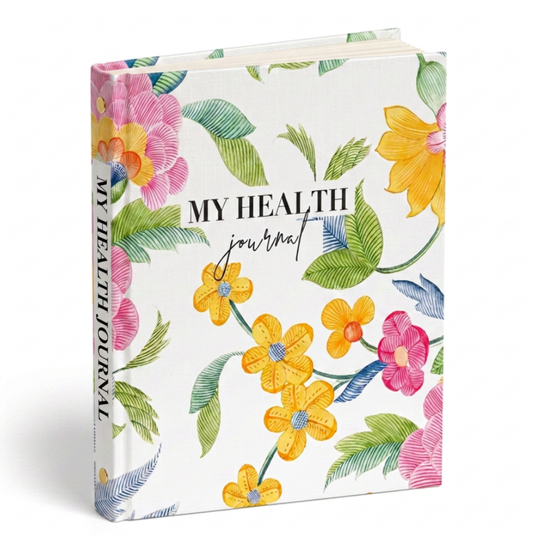 My Health Journal floral linen edition with colourful watercolour flowers and green leaves, standing upright on a white background